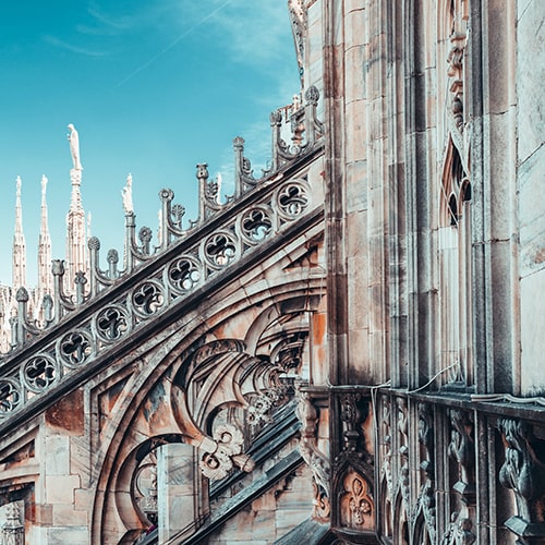 Photo of the exterior of a castle/gothic architectural structure - Mikita Yo on Unsplash