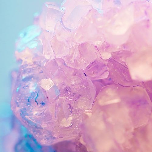 Macro photo of a pink crystal quartz cluster - Krystal Ng on Unsplash